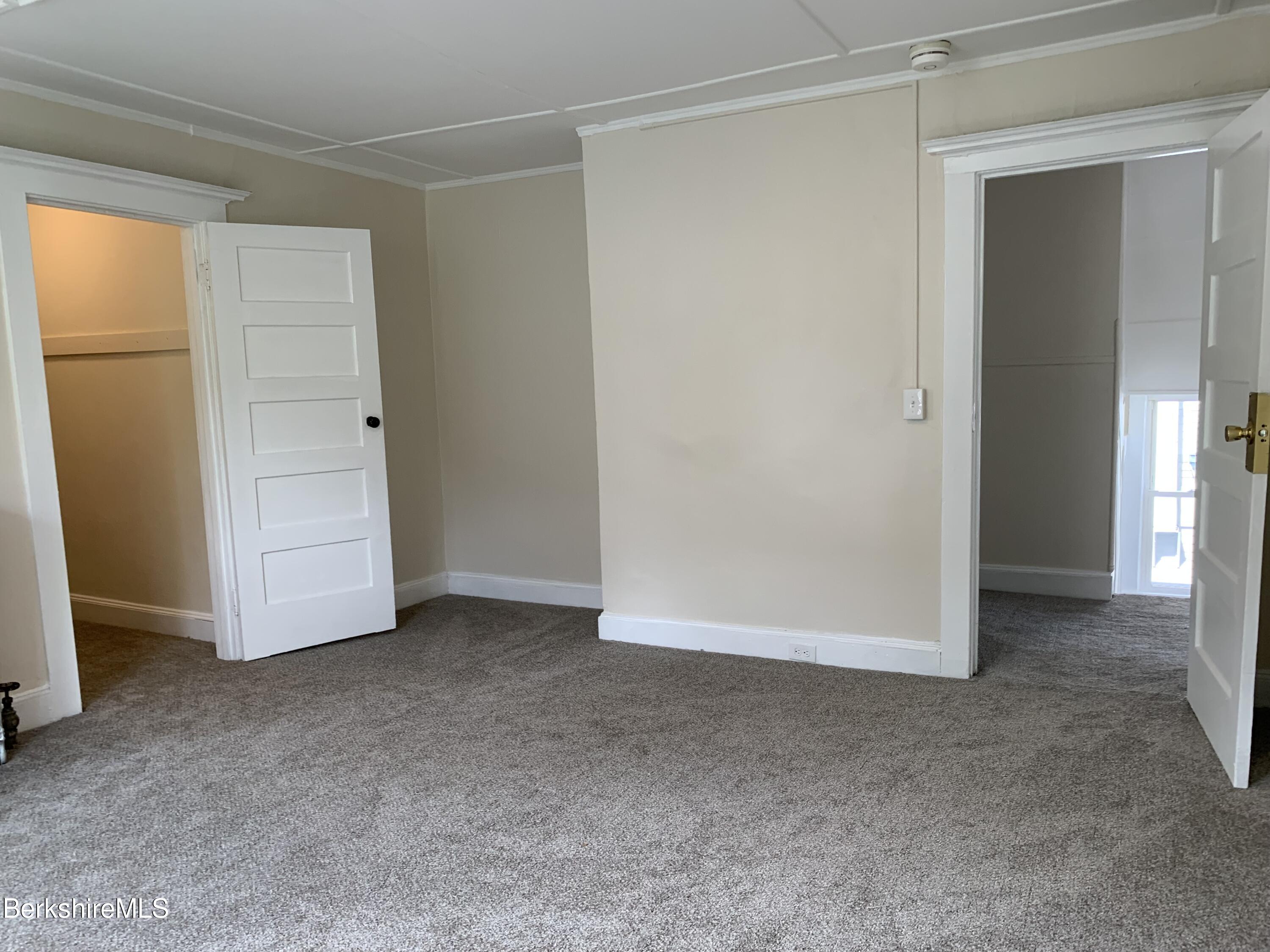 22 Copley Terrace Pittsfield, MA 01201 - Photo 31 of 42 an empty room with closet and windows