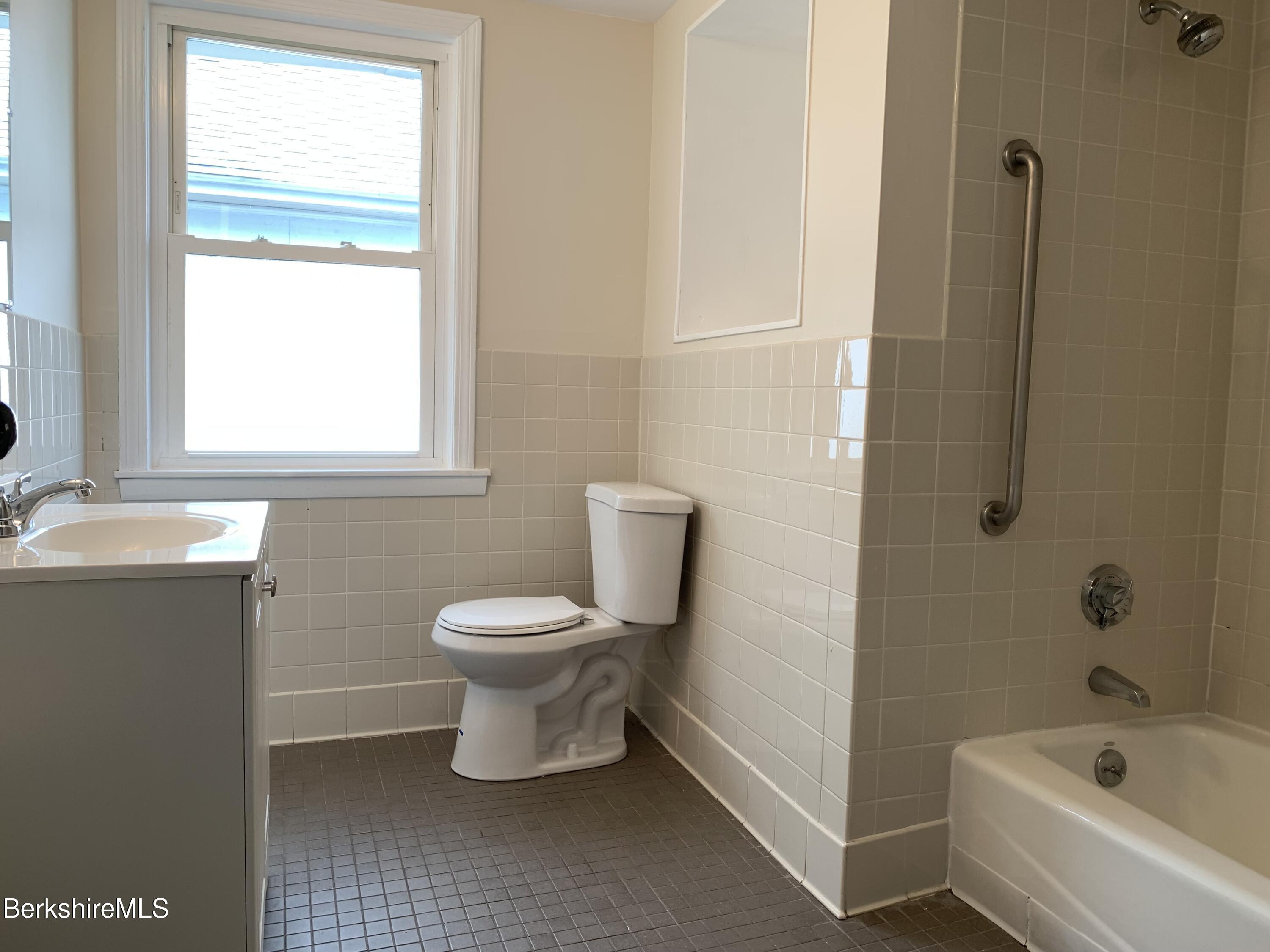 22 Copley Terrace Pittsfield, MA 01201 - Photo 35 of 42 a bathroom with a toilet sink and bathtub