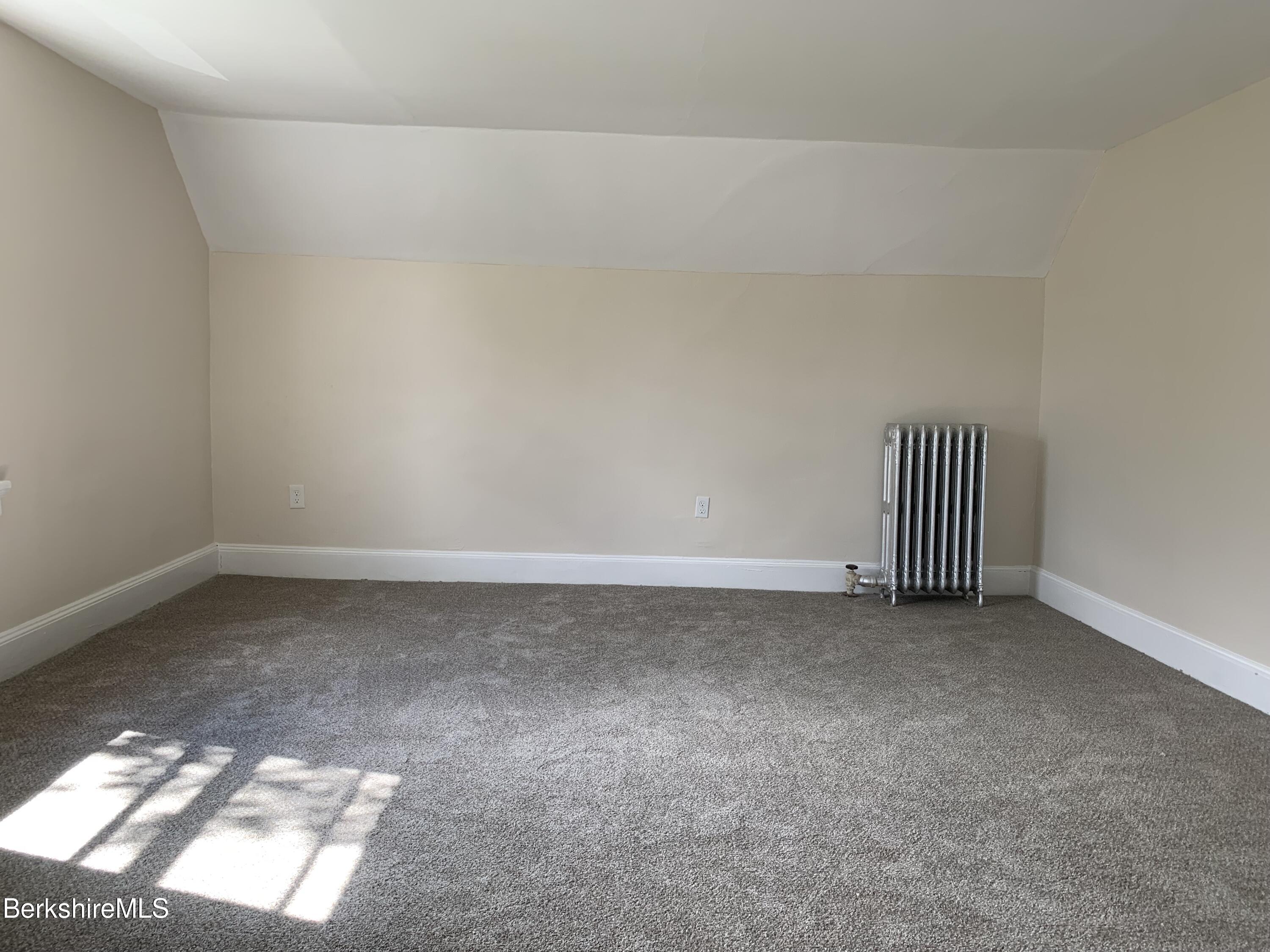 22 Copley Terrace Pittsfield, MA 01201 - Photo 38 of 42 a view of an empty room and window