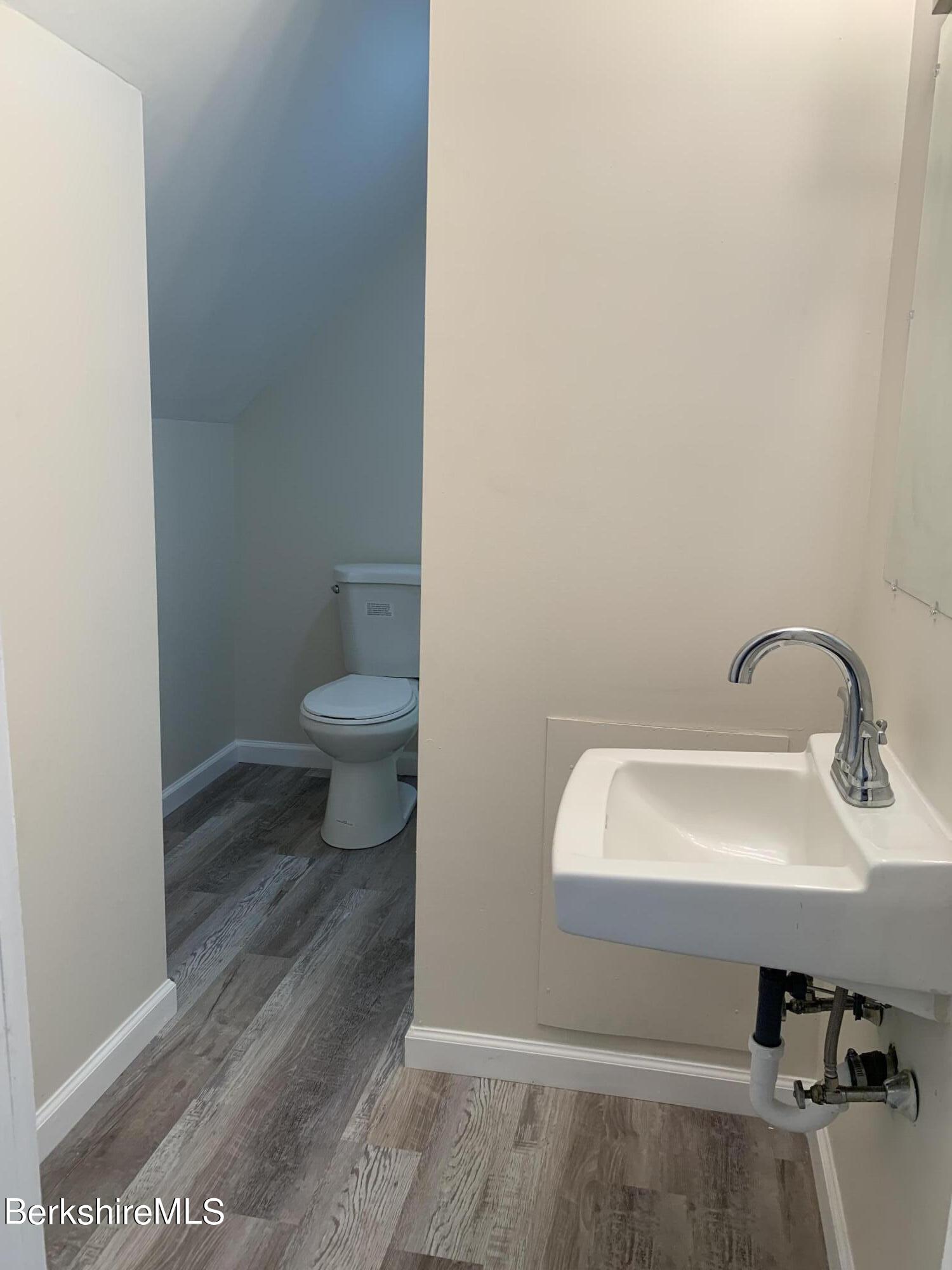 22 Copley Terrace Pittsfield, MA 01201 - Photo 40 of 42 a bathroom with a sink and a toilet
