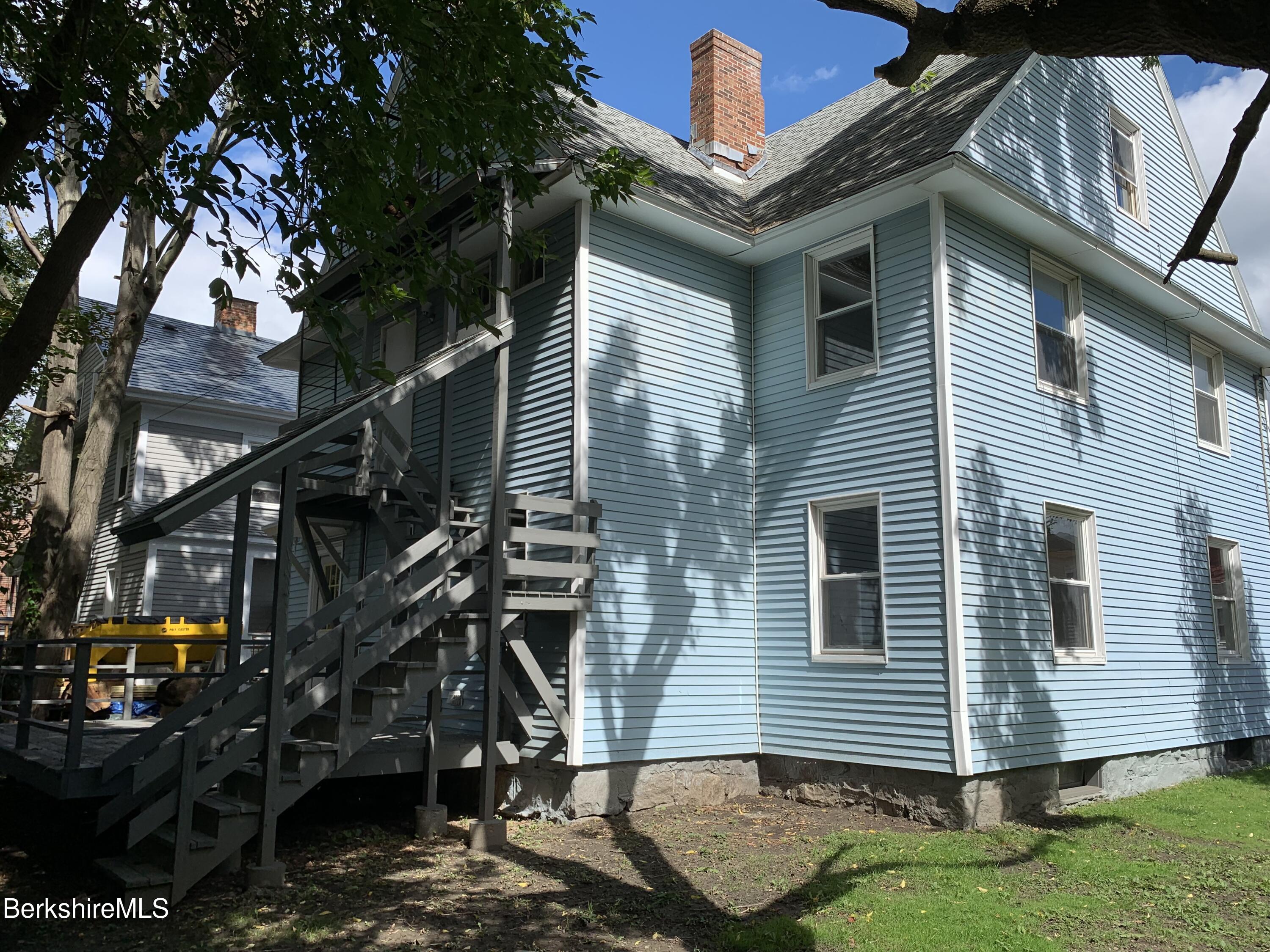 22 Copley Terrace Pittsfield, MA 01201 - Photo 7 of 42 a view of a house with a yard
