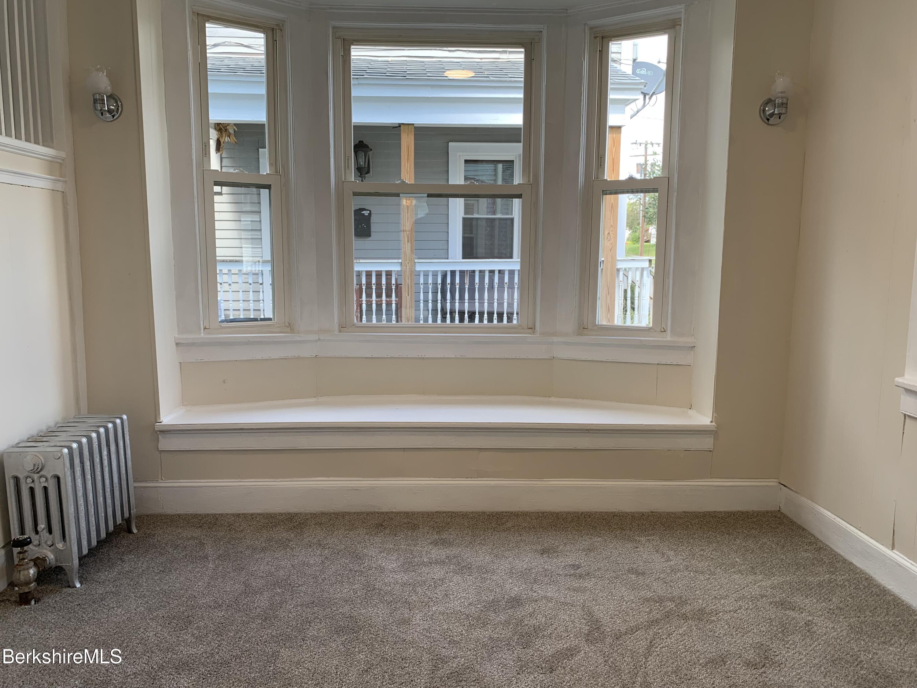 22 Copley Terrace Pittsfield, MA 01201 - Photo 10 of 42 a view of empty room with front door