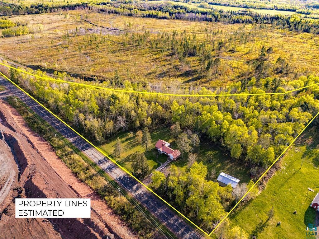 4543 County Road East South Range, WI 54874 - Photo 6 of 43 Expansive property featuring a central residence, a secondary outbuilding, and mature trees