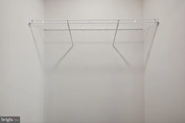 a bathroom with double sink and a mirror