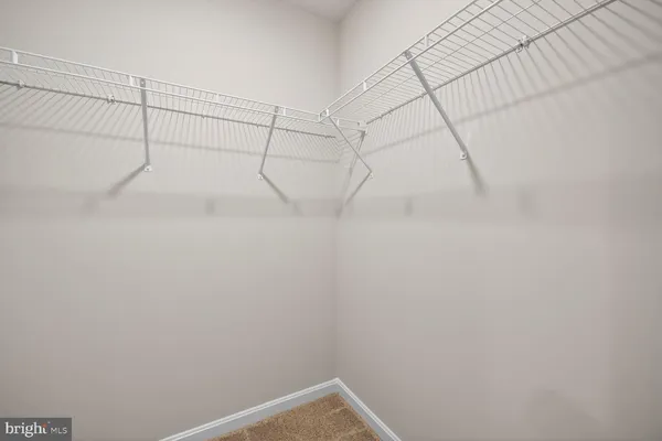 a bathroom with a toilet and bathtub