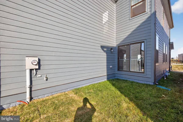 a picture of a bench in front of a building