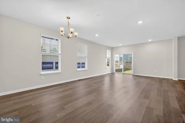 a view of kitchen with wooden floor