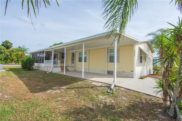 a house with a tree in front of it