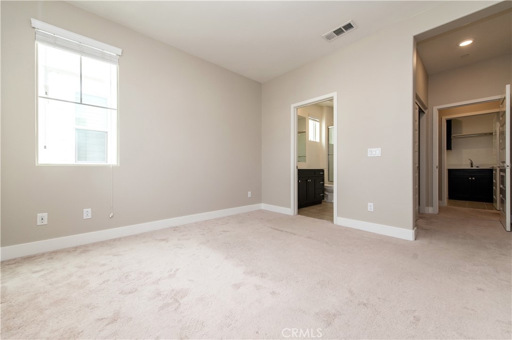 158 Scale Irvine, CA 92618 - Photo 16 of 23 an empty room with windows and closet