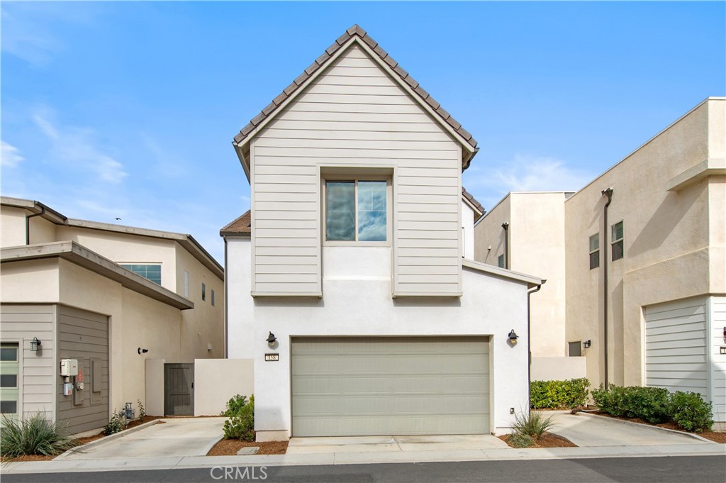158 Scale Irvine, CA 92618 - Photo 23 of 23 a view of a house with a yard and garage
