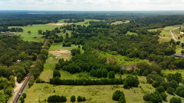 a view of a lake with a yard