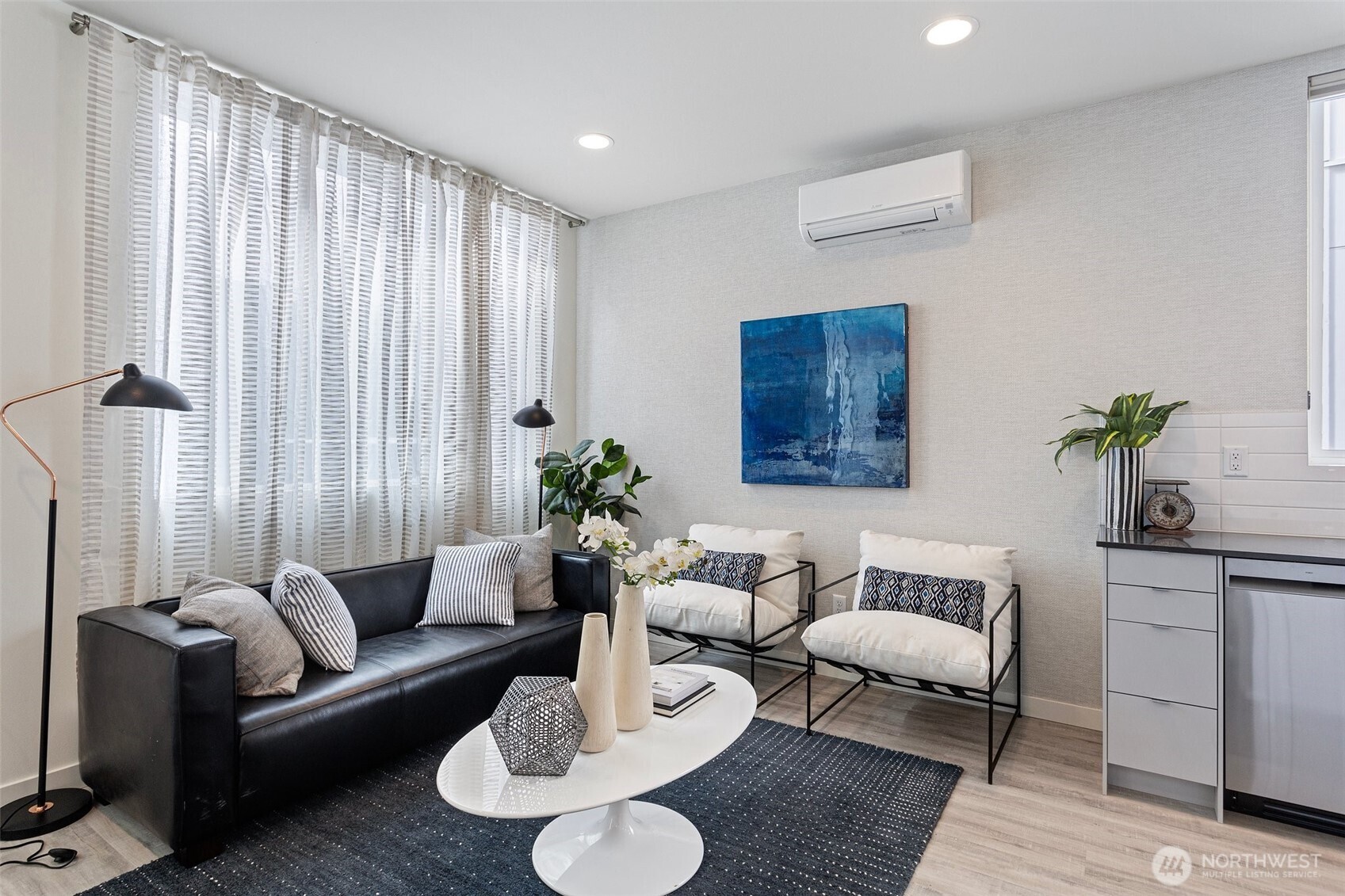 2527 29th Avenue South, Unit D Seattle, WA 98144 - Photo 6 of 20 a living room with furniture and wooden floor