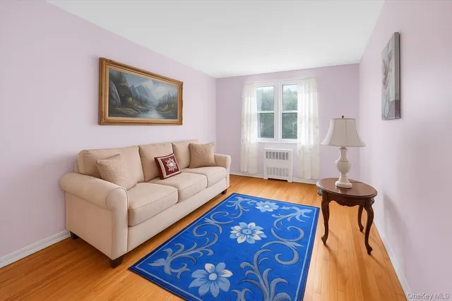 a living room with a couch and a table