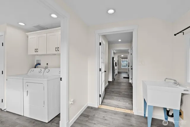 a view of a hallway with dining area