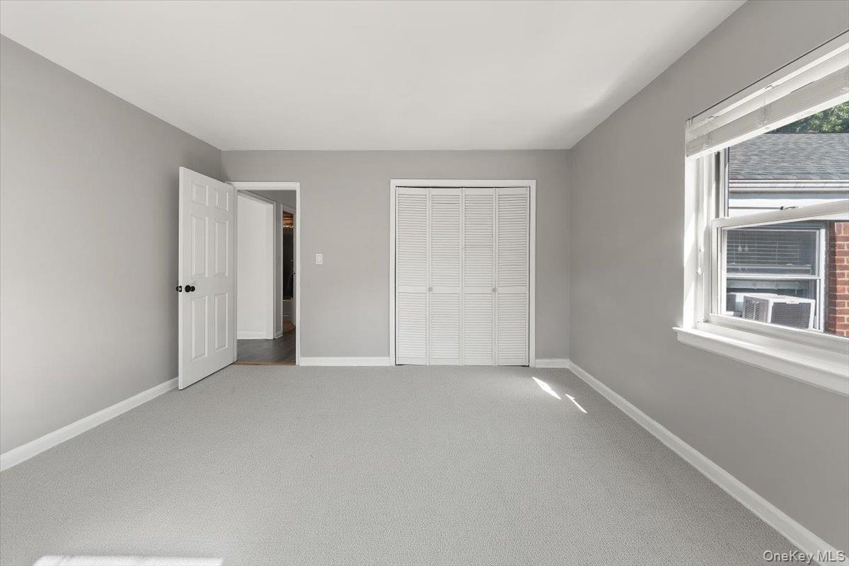470 Tuckahoe Road, Unit 4B Yonkers, NY 10710 - Photo 12 of 17 Unfurnished bedroom featuring carpet floors and a closet
