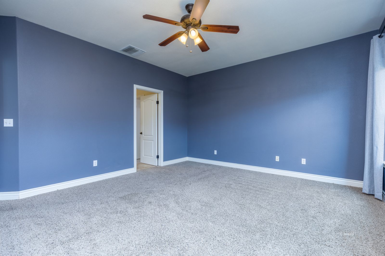 404 Christopher Court Ridgecrest, CA 93555 - Photo 16 of 31 a view of an empty room with a fan