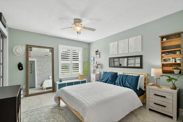 a view of a garage with rack and bicycle