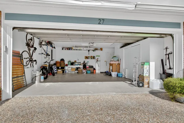 an aerial view of a house with a garden