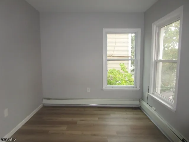 a view of a room that has a window in it