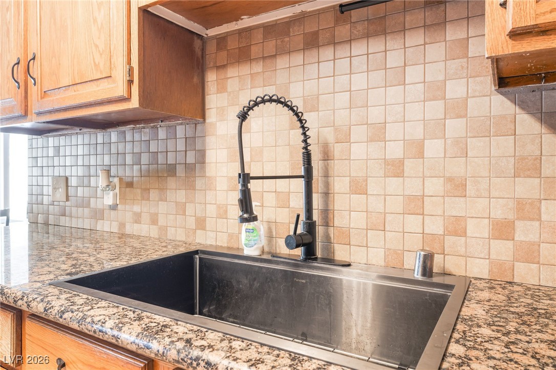 716 North 18th Street Las Vegas, NV 89101 - Photo 20 of 39 Kitchen view of backsplash and light stone counters