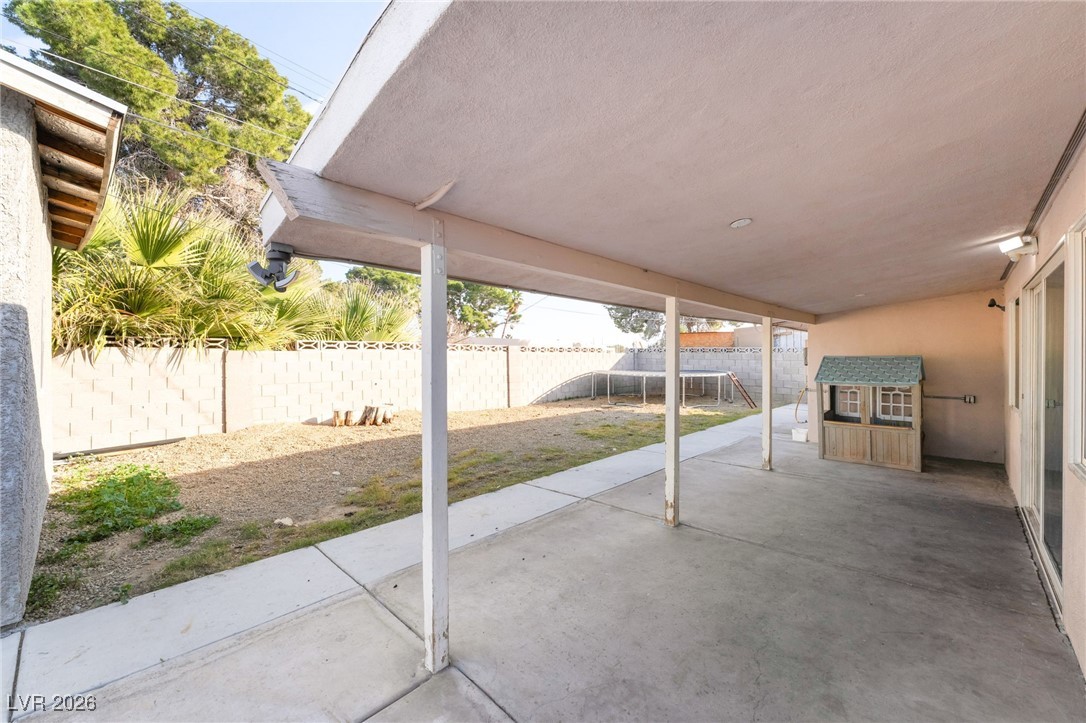 716 North 18th Street Las Vegas, NV 89101 - Photo 35 of 39 Fenced backyard featuring a patio area