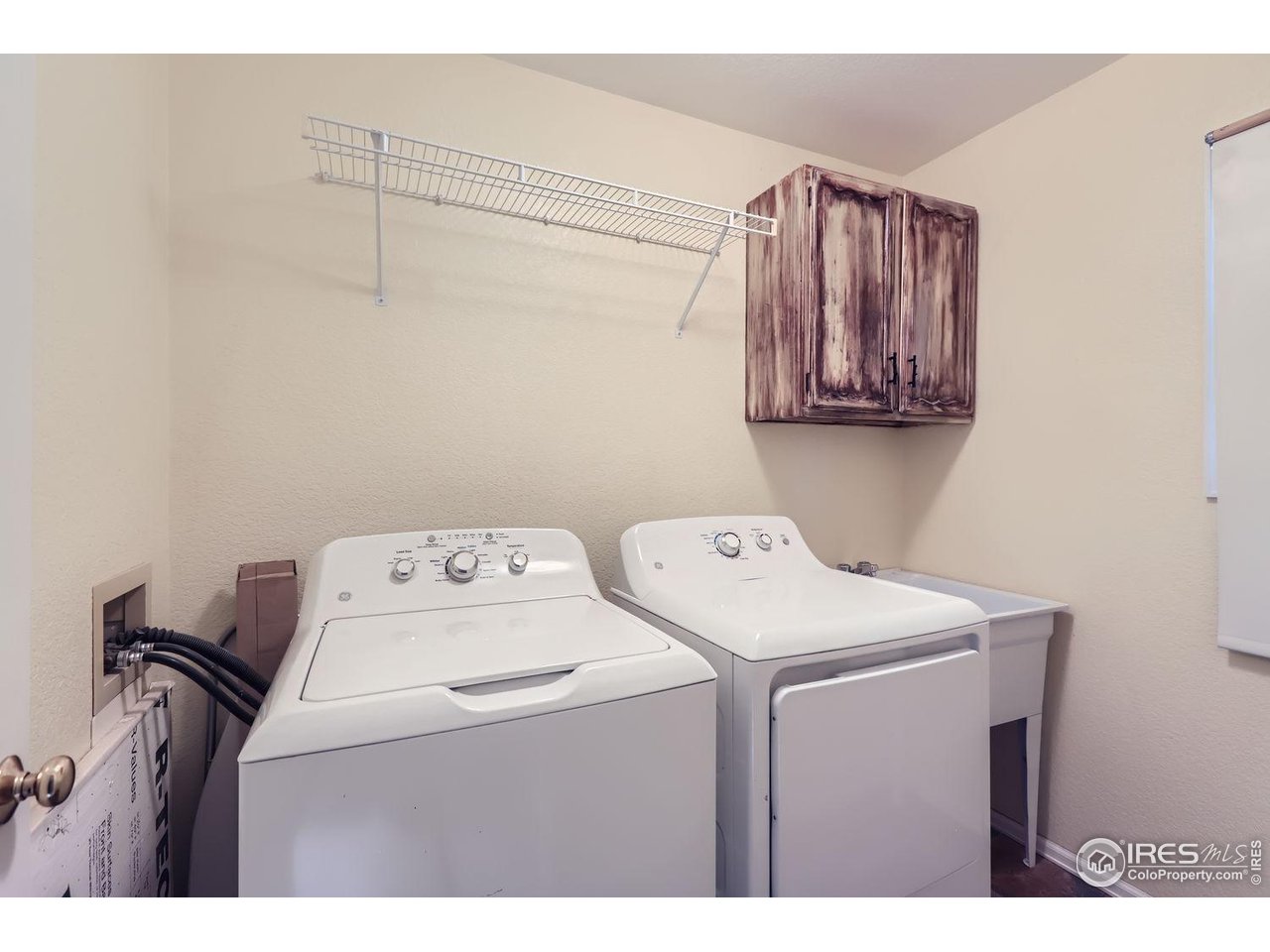 407 East Baseline Road Lafayette, CO 80026 - Photo 21 of 34 a utility room with dryer and washer