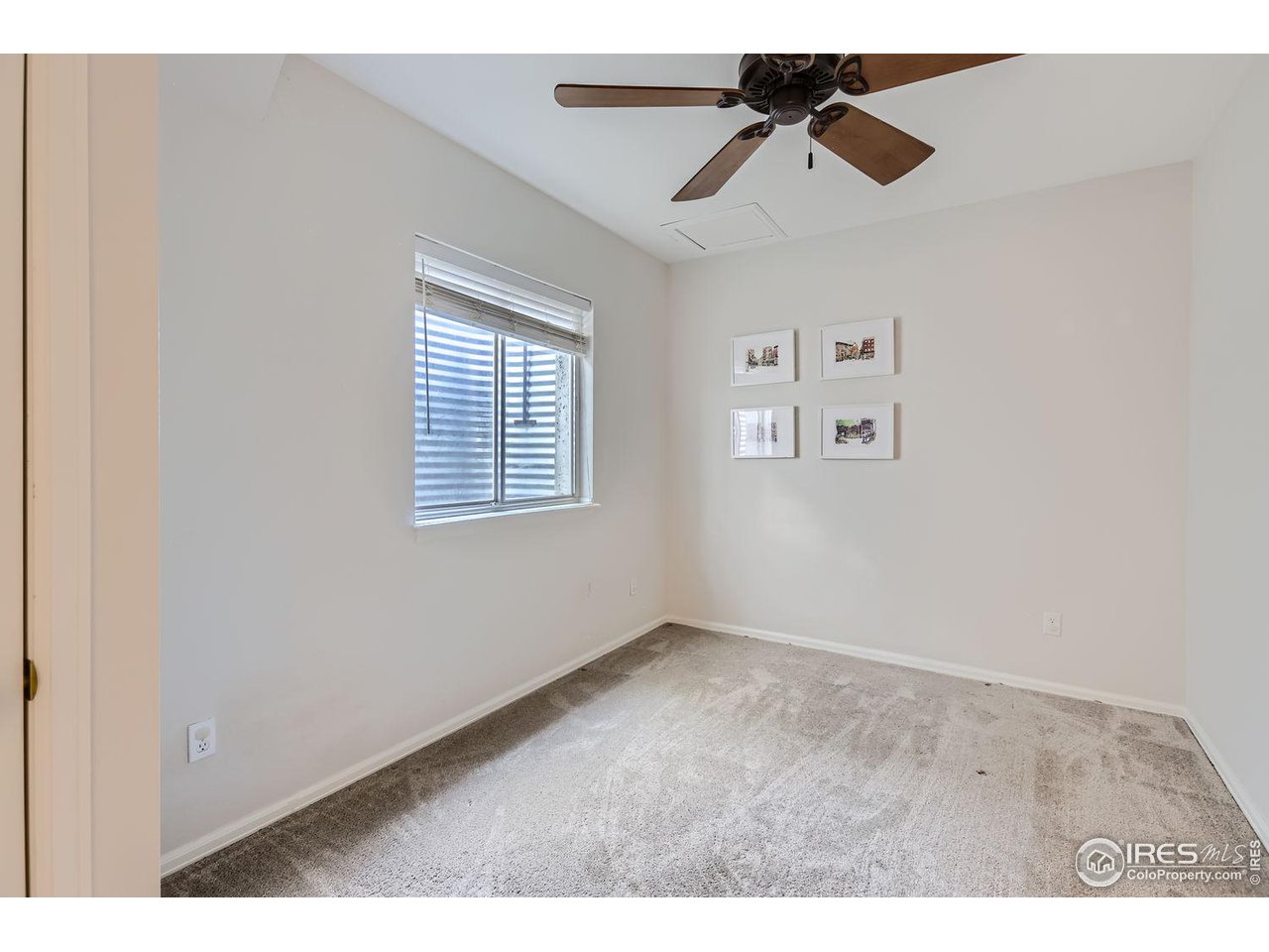 407 East Baseline Road Lafayette, CO 80026 - Photo 23 of 34 a view of an empty room with a window