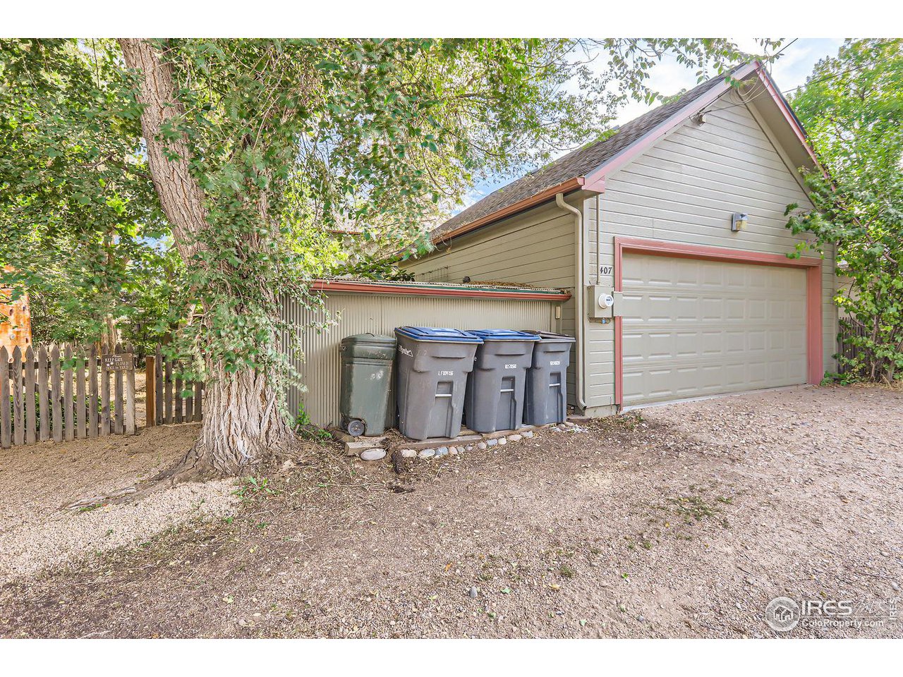 407 East Baseline Road Lafayette, CO 80026 - Photo 27 of 34 a view of backyard of house and garage