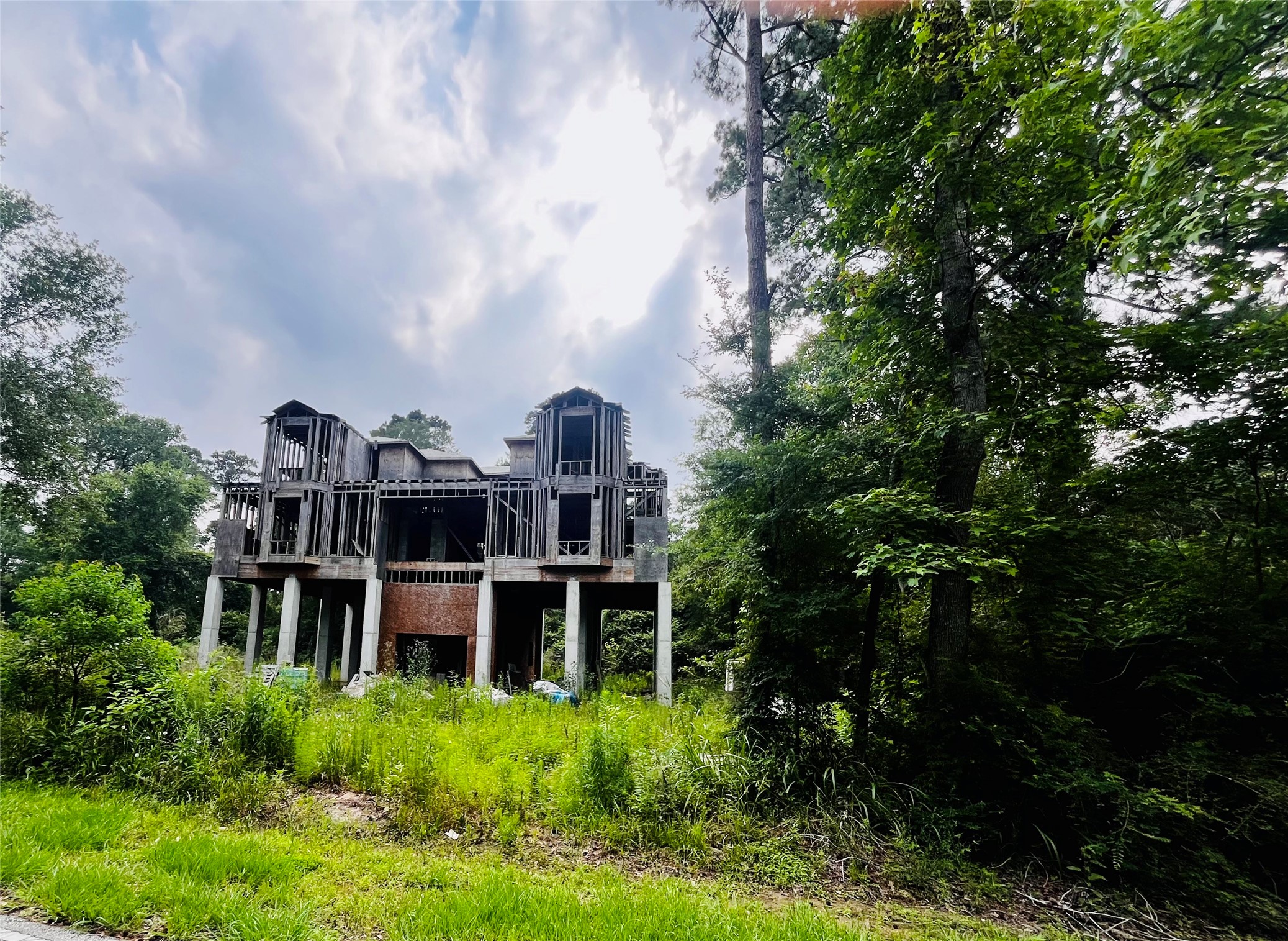 5026 Topway Drive Spring, TX 77373 - Photo 6 of 14 a view of a house with pool and garden