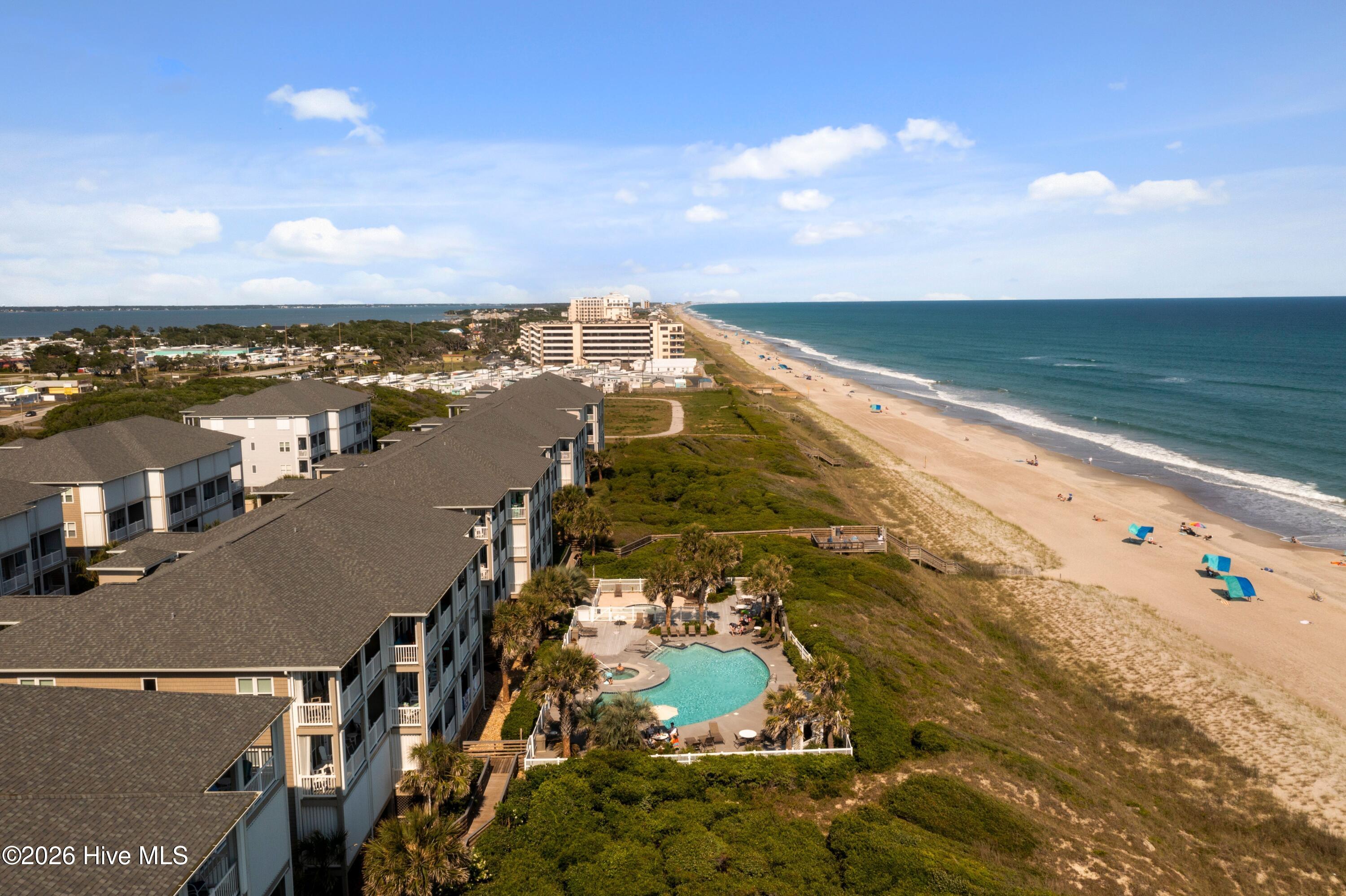1700 Salter Path Road, Unit R102 Indian Beach, NC 28512 - Photo 50 of 62 OC Aerial Oceanside Pool Looking East