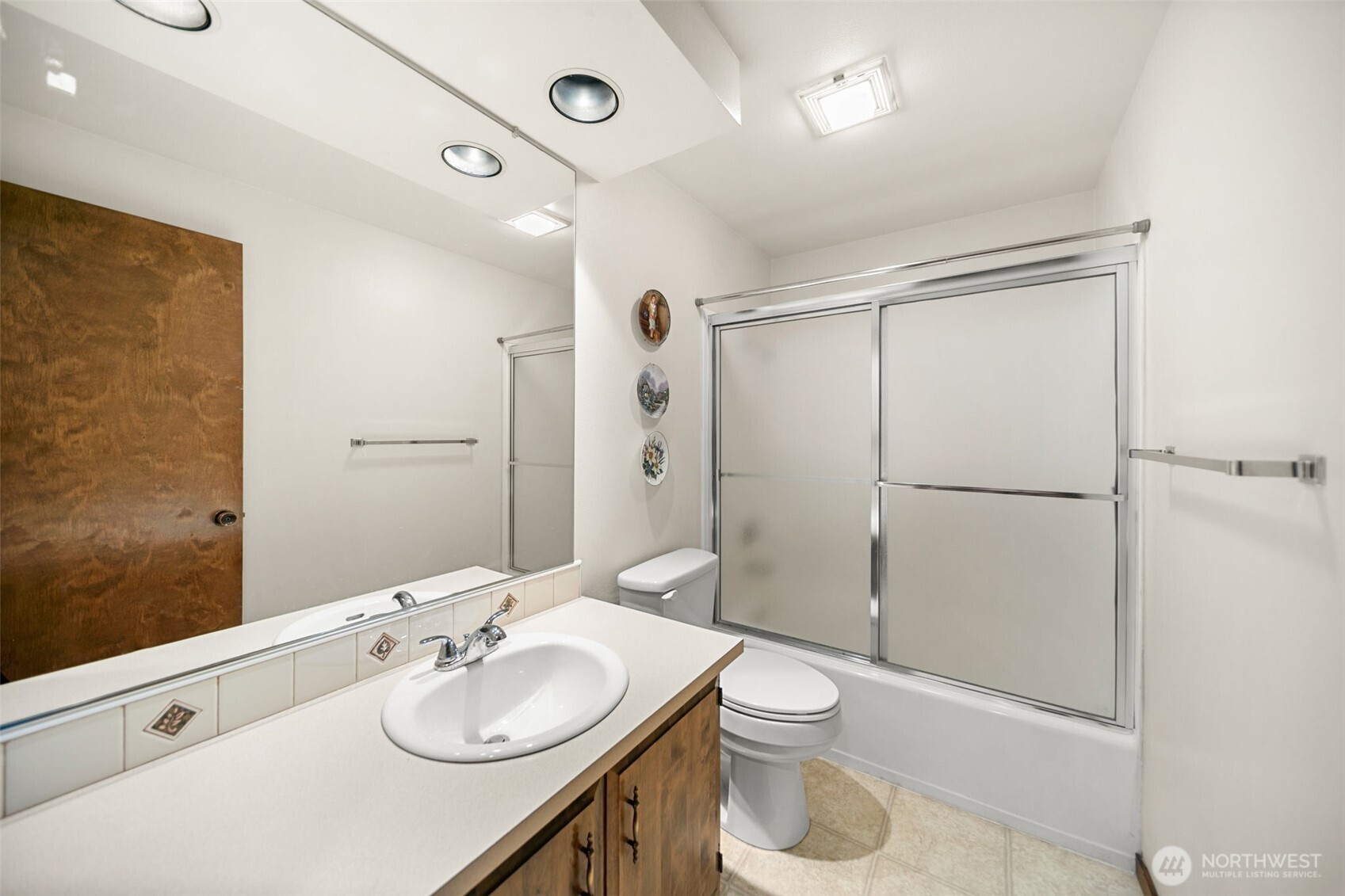 1310 Castlerock Avenue, Unit 9 Wenatchee, WA 98801 - Photo 24 of 33 a bathroom with a sink toilet and shower