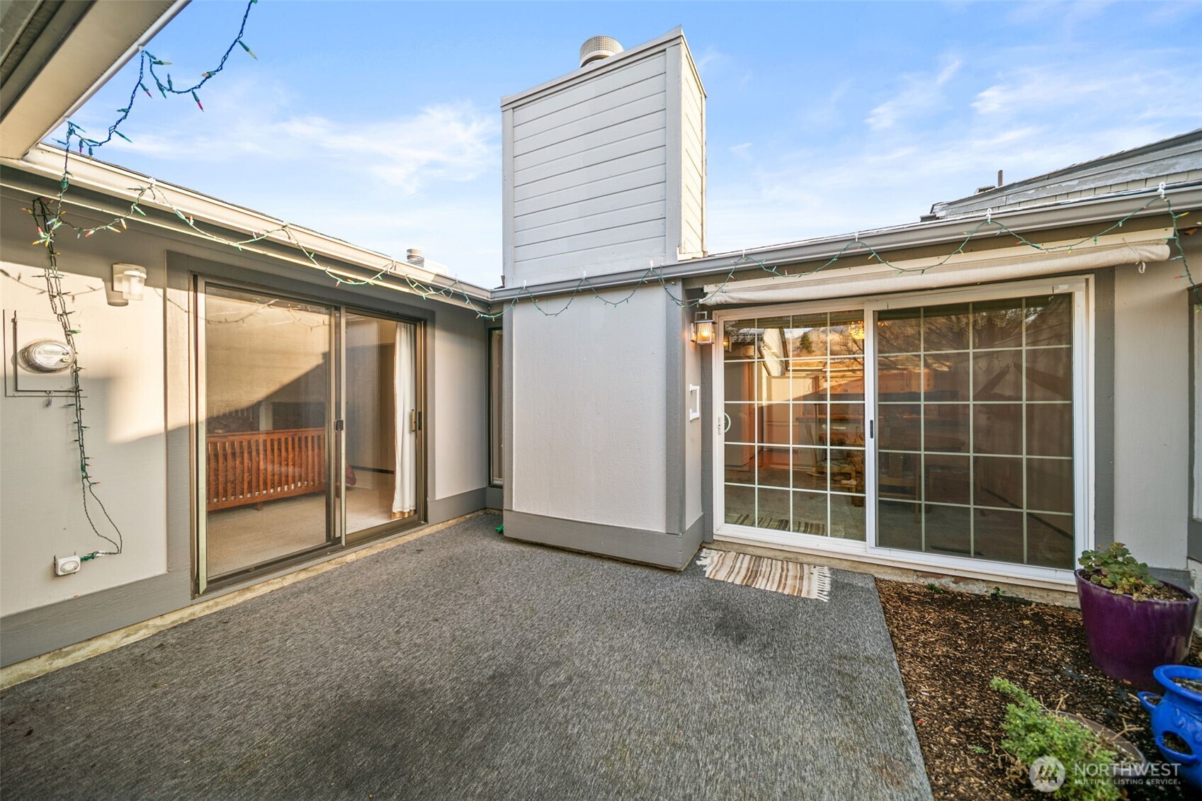 1310 Castlerock Avenue, Unit 9 Wenatchee, WA 98801 - Photo 25 of 33 a view of an empty room with a balcony