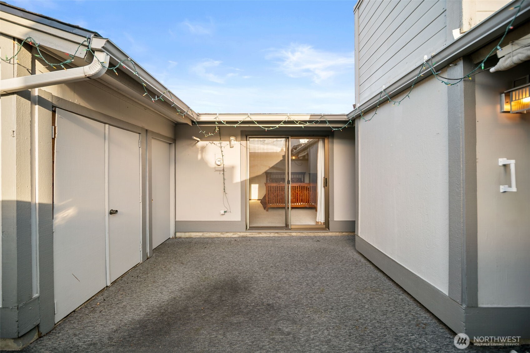 1310 Castlerock Avenue, Unit 9 Wenatchee, WA 98801 - Photo 26 of 33 a view of empty room with wooden floor and fan