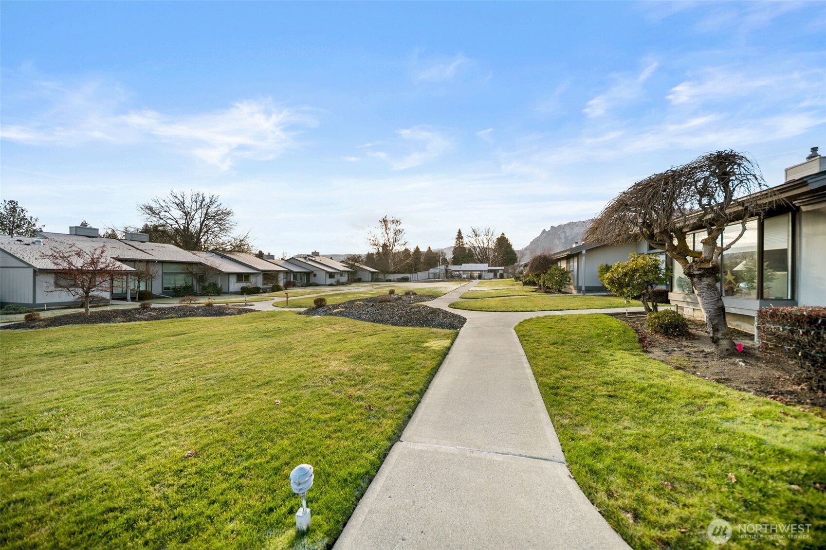 1310 Castlerock Avenue, Unit 9 Wenatchee, WA 98801 - Photo 30 of 33 a view of a lake with houses