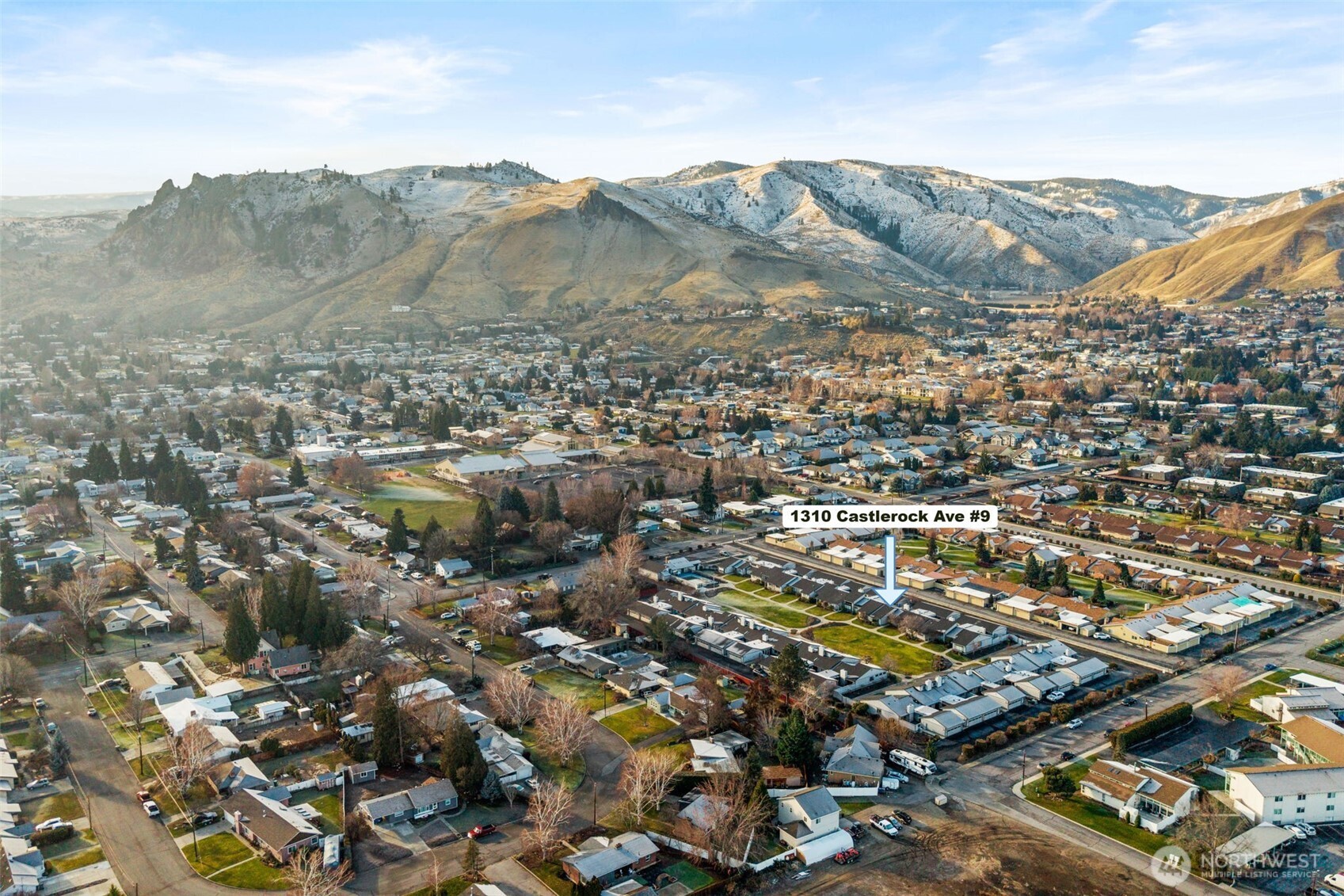 1310 Castlerock Avenue, Unit 9 Wenatchee, WA 98801 - Photo 32 of 33 an aerial view of residential houses with outdoor space