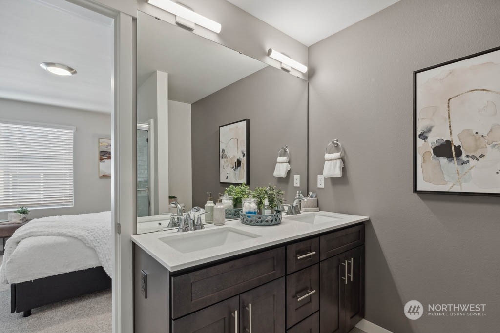 9614 19th Avenue Southeast, Unit E Everett, WA 98208 - Photo 14 of 17 a bathroom with a sink double vanity and a mirror