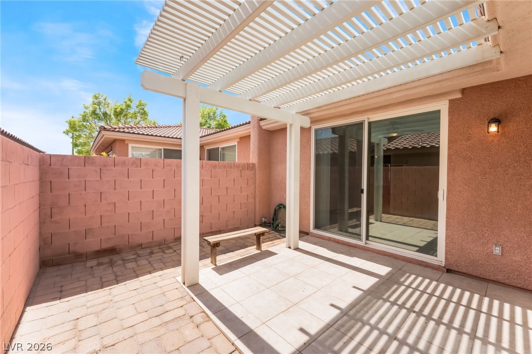 10481 Riverside Park Avenue Las Vegas, NV 89135 - Photo 33 of 51 View of patio with a pergola