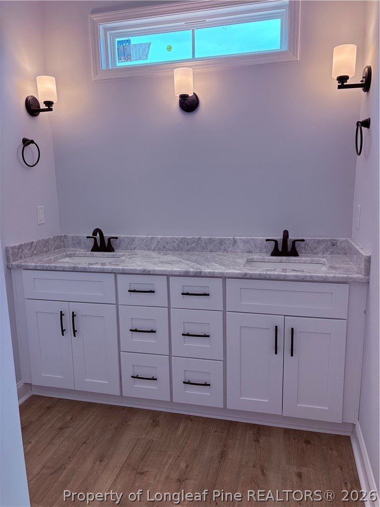 1075 Purdie-Hall Road Tar Heel, NC 28392 - Photo 10 of 28 a bathroom with a granite countertop sink and a mirror