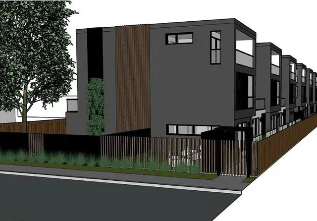 a view of a car park in front of house