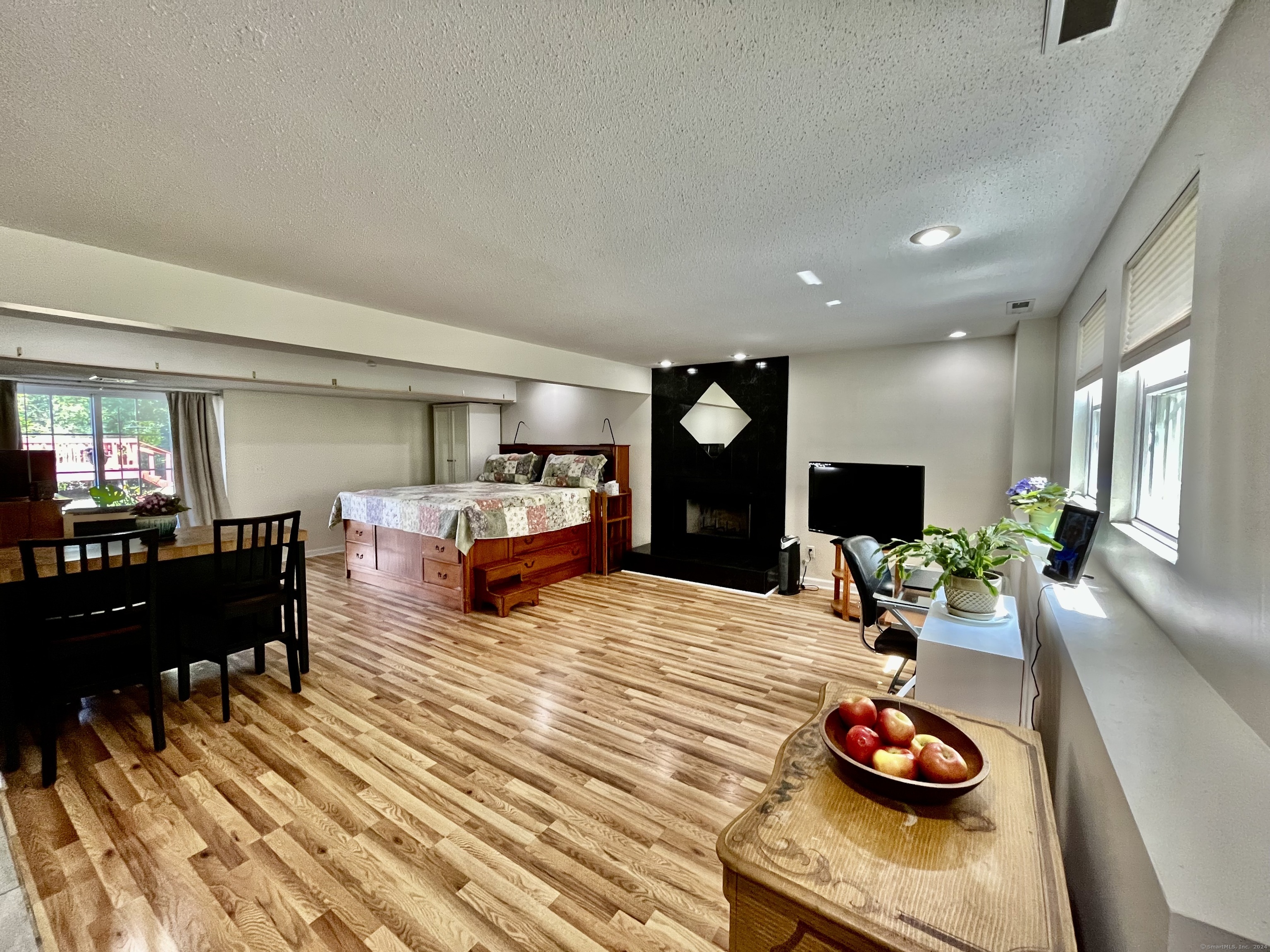 390 Stevenson Road New Haven, CT 06515 - Photo 1 of 1 In-law studio apartment with stunning wood burning fireplace and kitchenette.