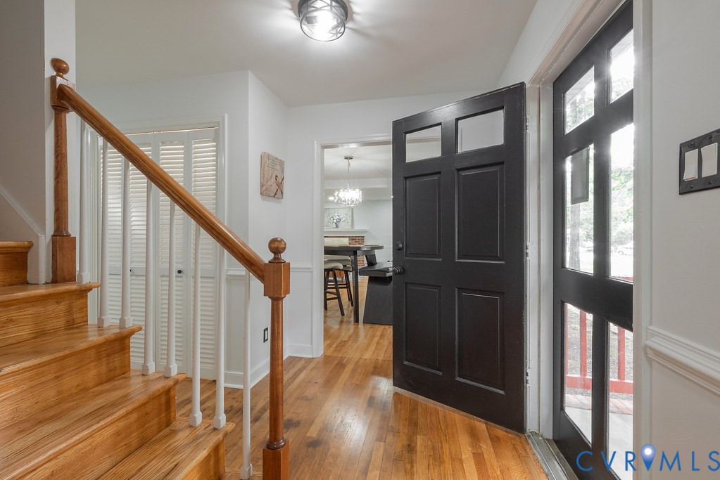 11840 Winfore Drive Midlothian, VA 23113 - Photo 5 of 40 Front entry featuring wood-finish flooring, a cont