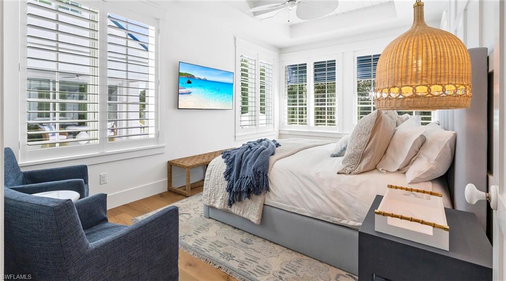 844 8th Street South Naples, FL 34102 - Photo 12 of 13 a bedroom with furniture and a window