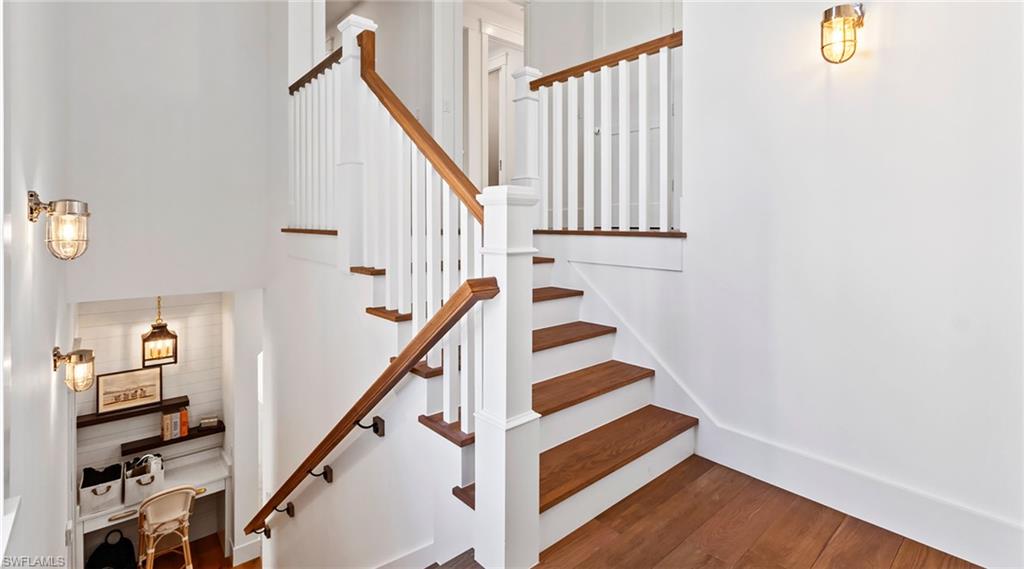 844 8th Street South Naples, FL 34102 - Photo 13 of 13 a view of entryway with wooden floor and stairs