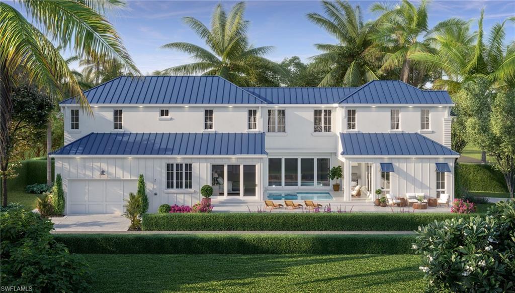 844 8th Street South Naples, FL 34102 - Photo 2 of 2 a front view of a house with a garden and plants