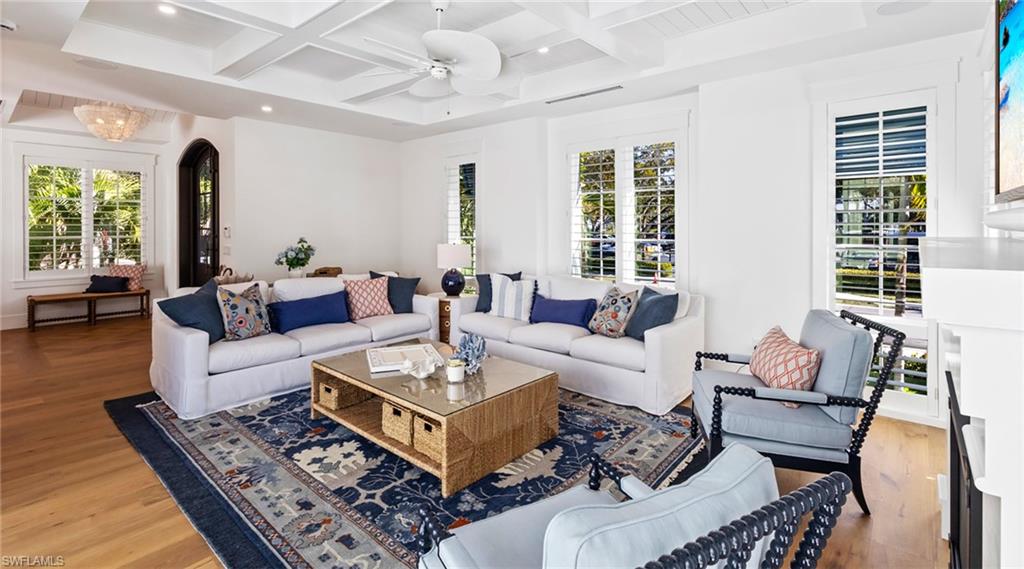 844 8th Street South Naples, FL 34102 - Photo 5 of 13 a living room with furniture and a large window