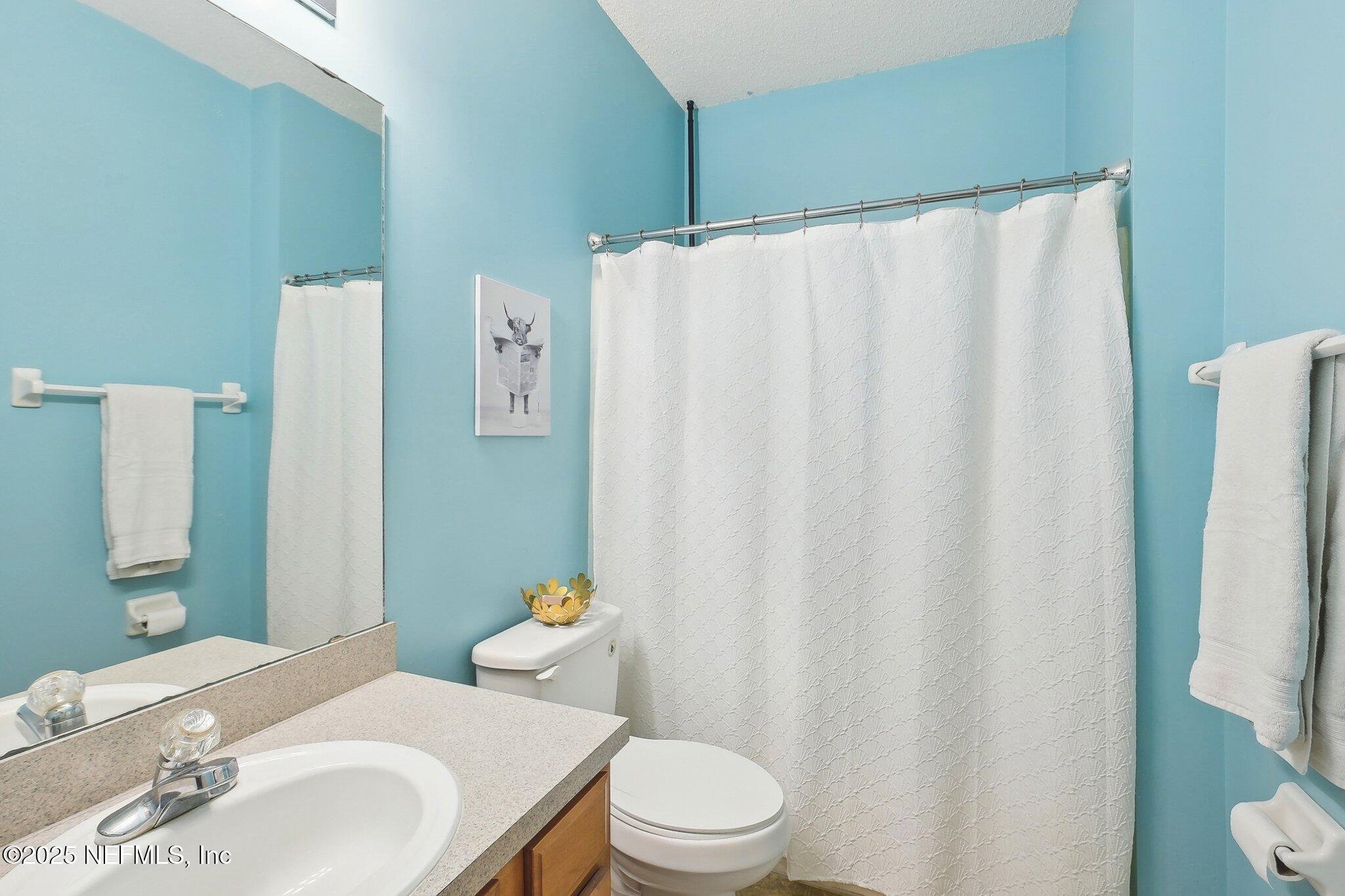 12529 Cliffrose Trail Jacksonville, FL 32225 - Photo 15 of 23 a bathroom with a sink and toilet