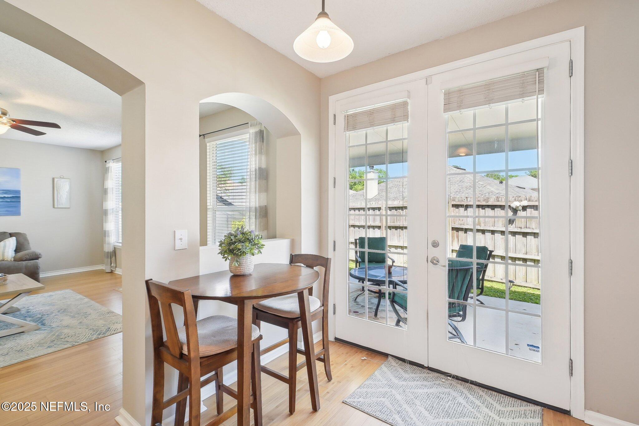 12529 Cliffrose Trail Jacksonville, FL 32225 - Photo 6 of 23 a dining room with furniture and window