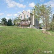 9055 North Nicholson Road Fowlerville, MI 48836 - Photo 6 of 24 Backyard