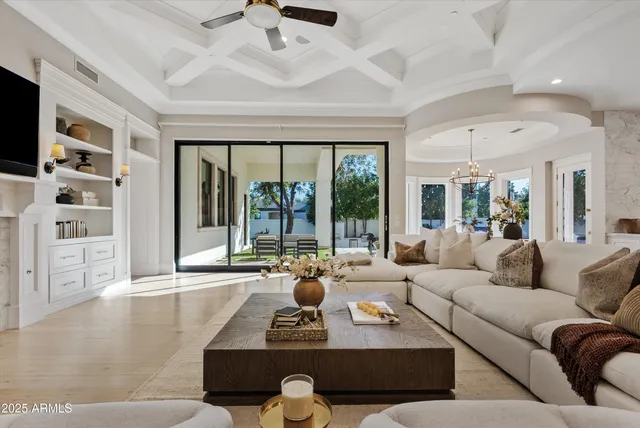 a dining room with a table and chairs