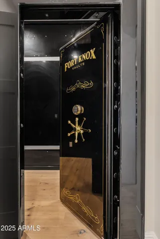 a view of living room kitchen and entryway